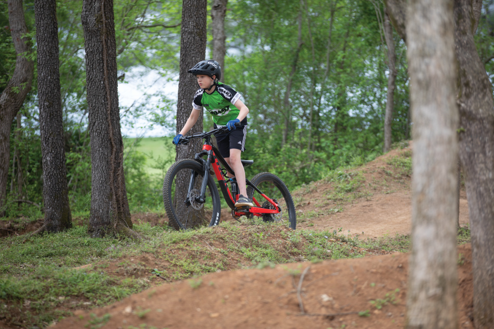Columbia Cycling Club members make their way around an obstacle course while riding at Chickasaw Trace Park in Maury County, Tennessee.