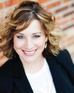Headshot of Alisha Hutchens.