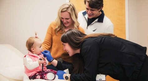 Family gets a check up for their young daughter at Hugh Chatham Health in Surry County, NC.