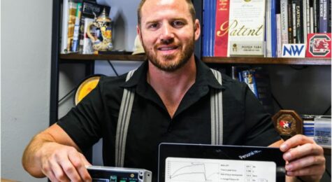 Ben Durbin in his office showing True Force Technologies benefits.