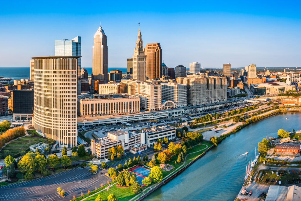 Aerial view of the Cleveland Ohio skyline along the Cuyahoga River and Lake Erie.