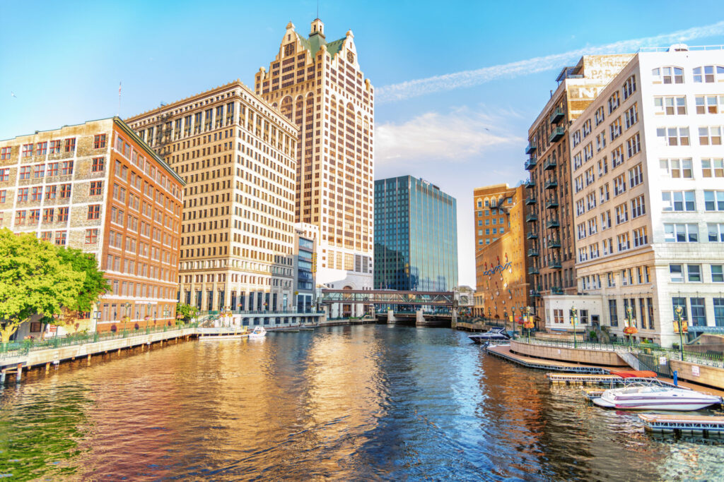 Aerial view of the Milwaukee Wisconsin skyline looking south along Lake Michigan and park trails.