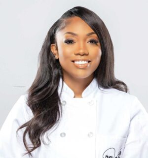 Headshot of DeVanae Mitchell, owner of DeVour Catering.