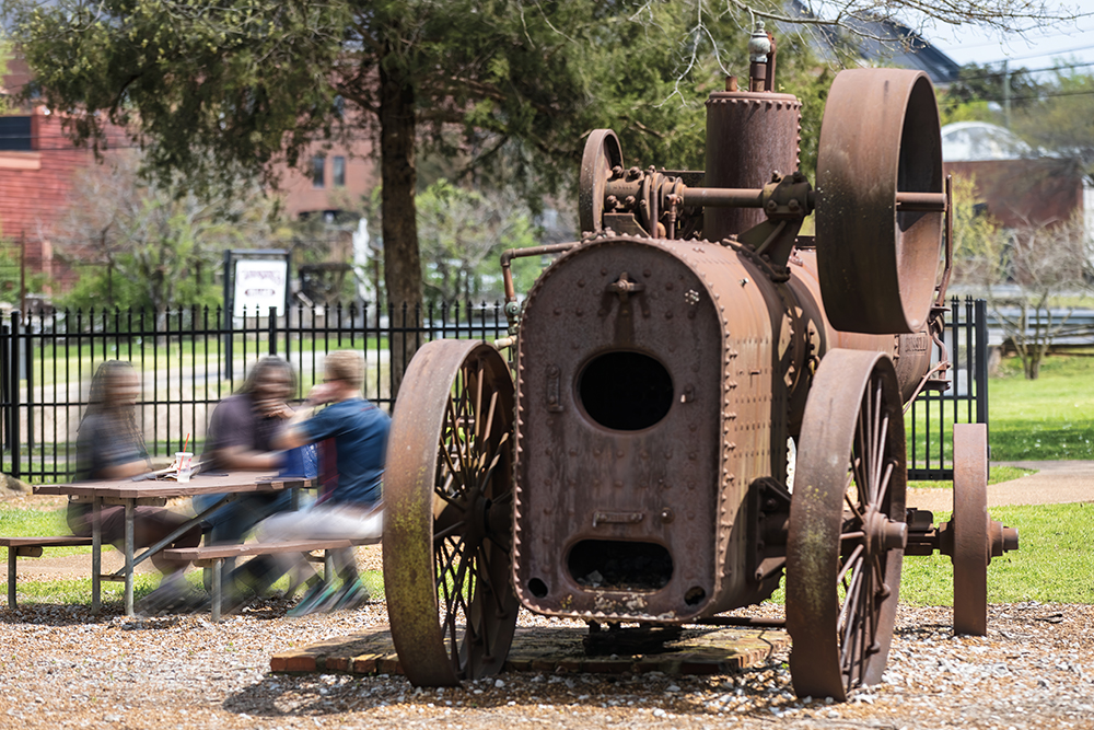 Visitors gather outdoors at Cannonsburgh Village in Murfreesboro, Tennessee.
