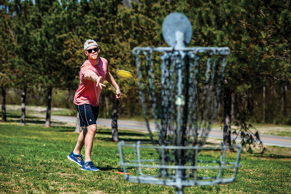 Disc golf players at Barfield Crescent Park in Murfreesboro, TN.