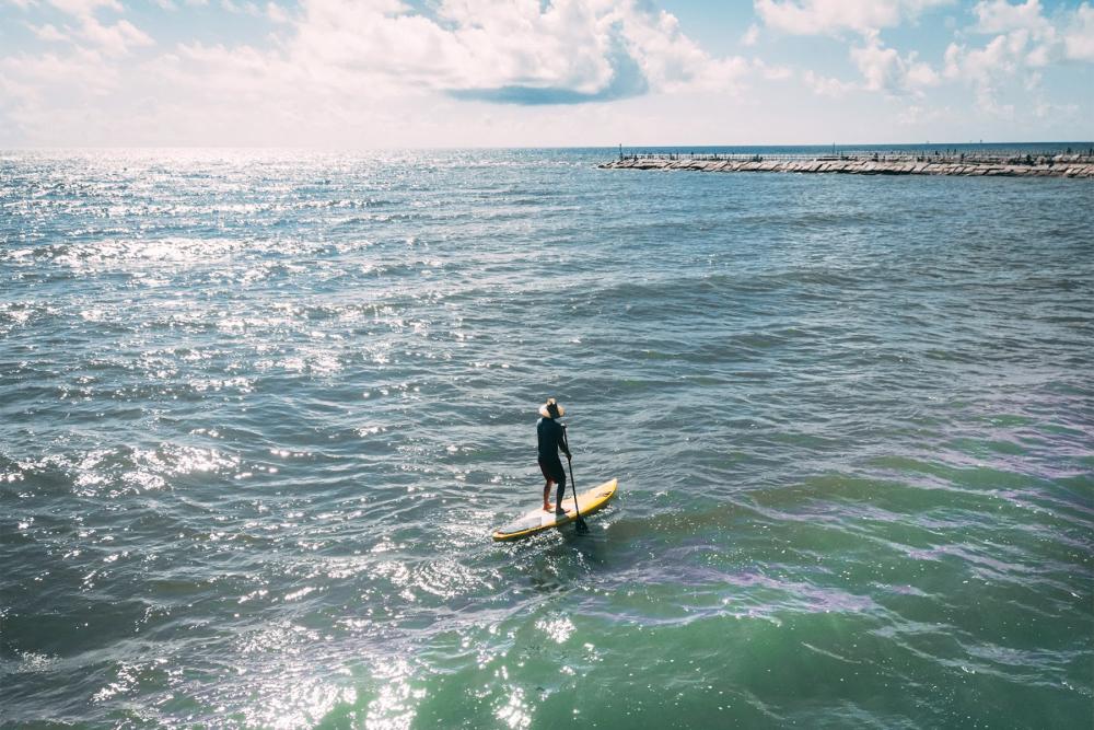 paddleboarder on the ocean