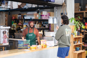 Community Grocery in downtown Corpus Christi offers everything from grab-and-go sandwiches and hard-to-find products to gathering spaces where people can play games.