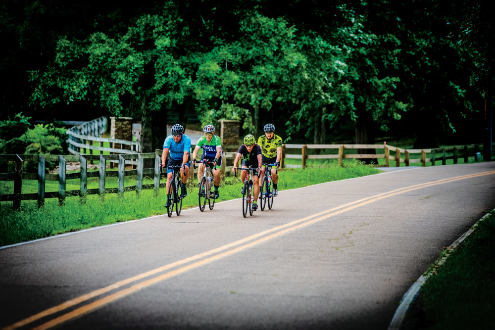 Cyclists riding through the countryside in Collierville, TN