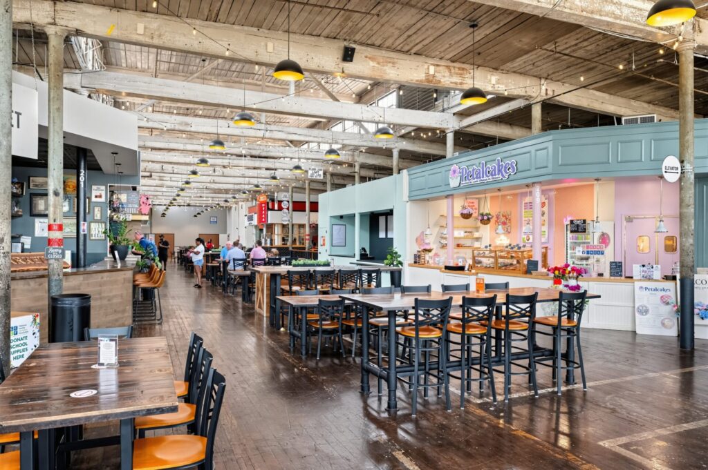 Indoor seating near Petalcakes in Gibson Mill Market