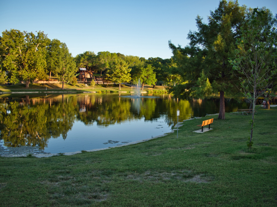 Fountain Spraying into Reflective Waters at Sar Ko Par Park in Lenexa Kansas