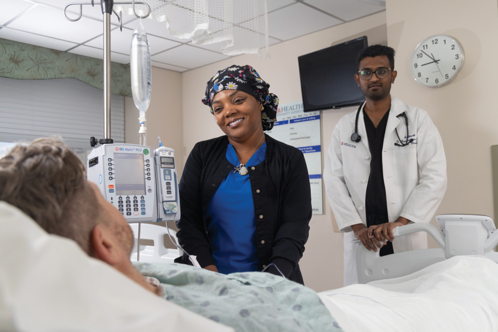 Physicians & Nurses at patient bedside at USA Health University Hospital 