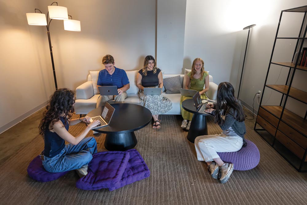 Employees meet in an informal setting at Valerie Health in the Edney Innovation Center in downtown Chattanooga, Tennessee.
