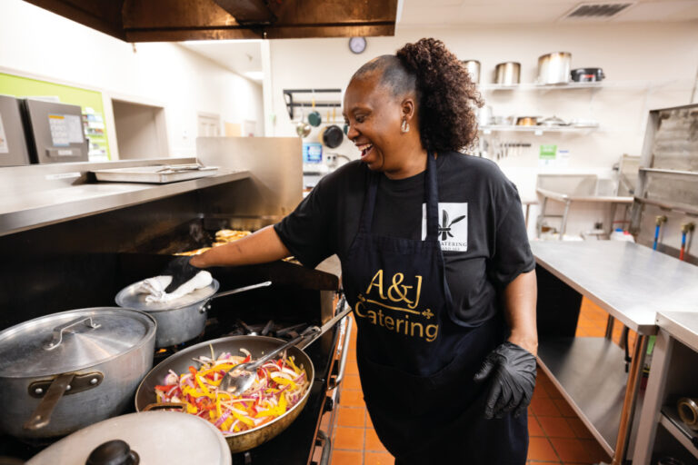 Angie Nettles prepares food for a taco bar for a catering client of her A&J Catering business in the Continental Kitchen in Mobile.